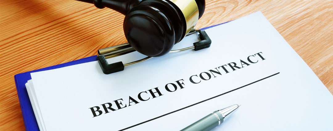 Navigating an IRS audit: legal paperwork, gavel, and contract breach notice.